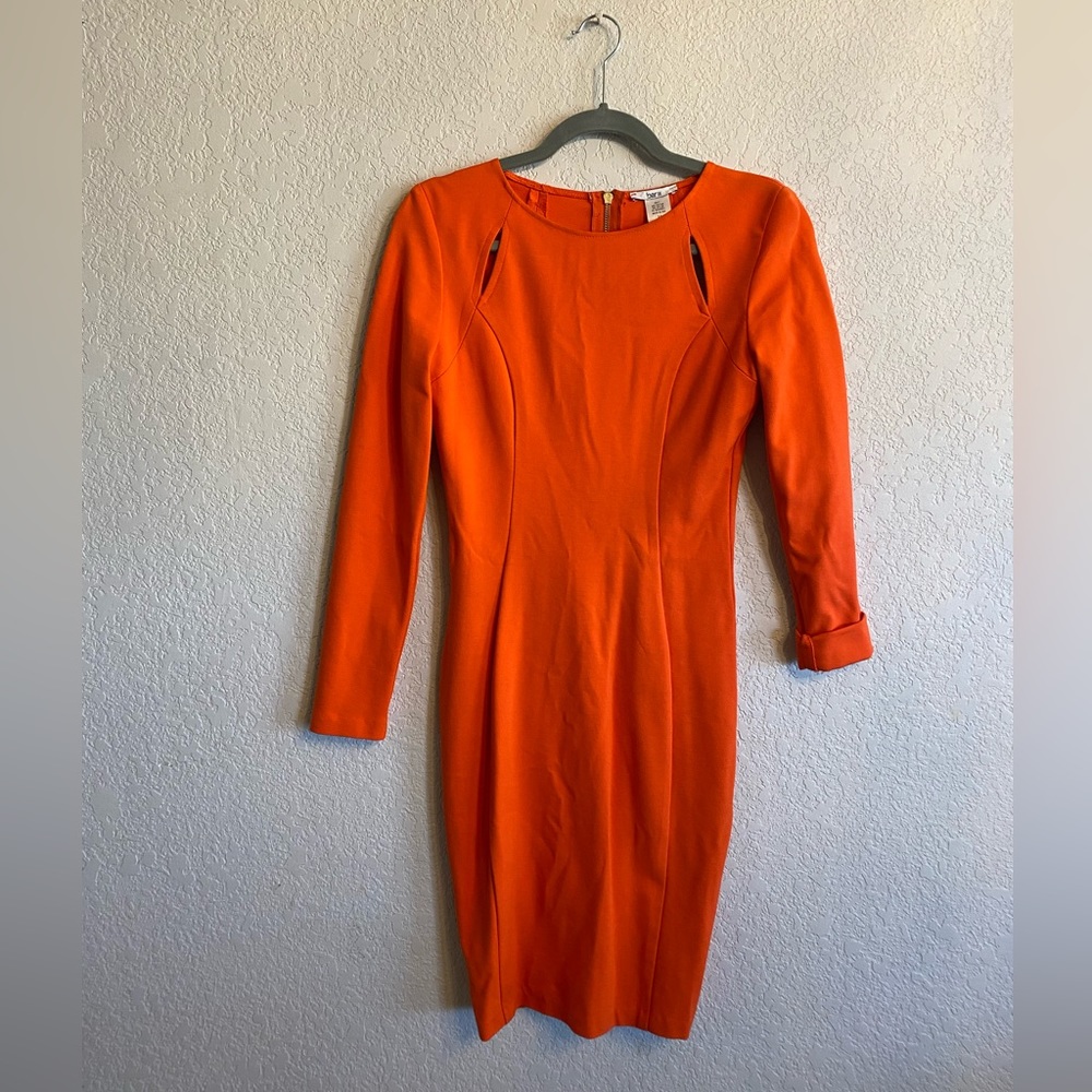 Orange long sleeve dress with cut outs